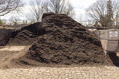 Color enhanced brown mulch